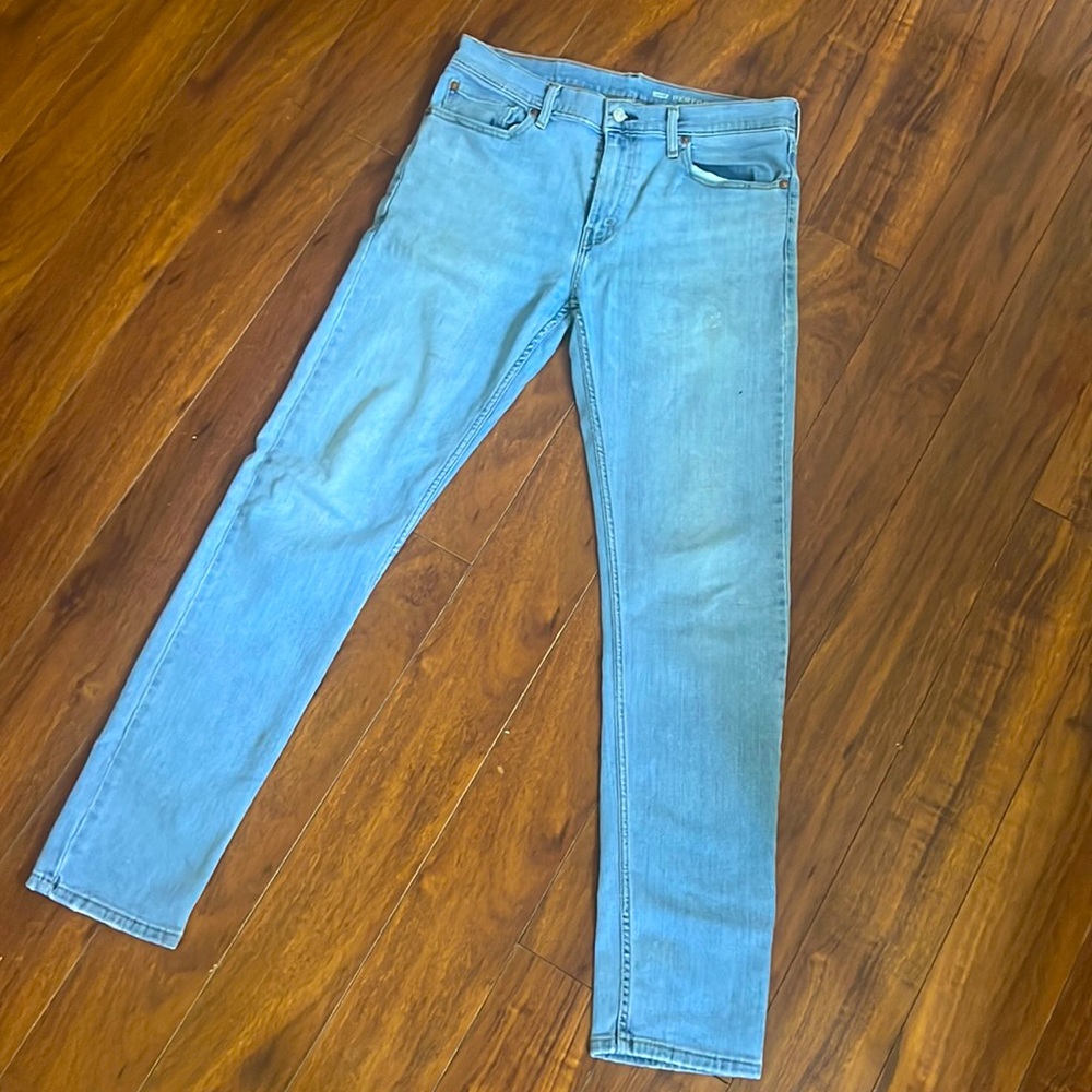 Levi’s 502 light wash. Some wear and tear (pictured)